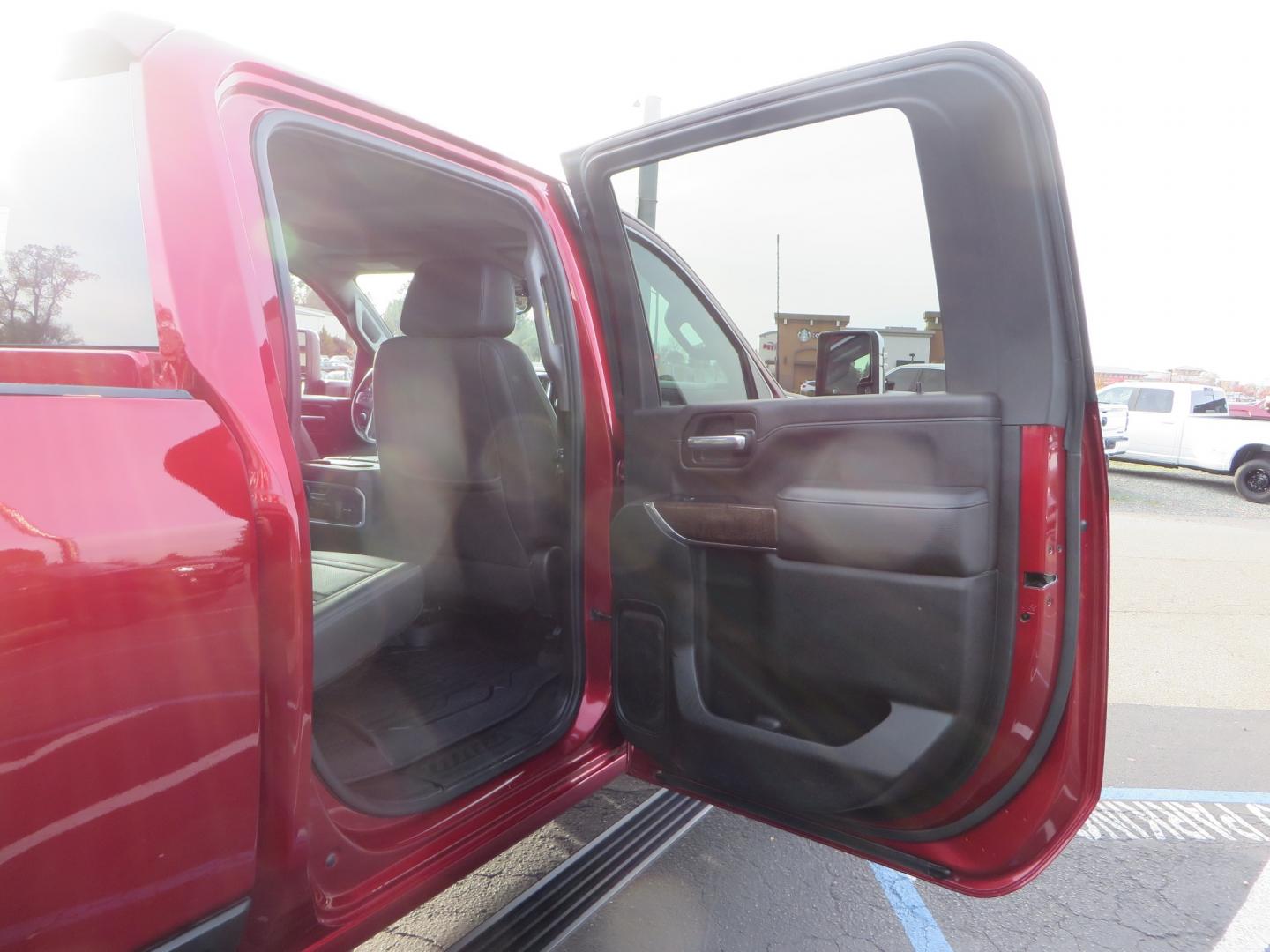 2021 MAROON /BLACK GMC Sierra 3500HD Denali (1GT49WEY1MF) with an Duramax 6.6L Turbo Diesel engine, 10 speed transmission, located at 2630 Grass Valley Highway, Auburn, CA, 95603, (530) 508-5100, 38.937893, -121.095482 - Duramax sitting on a BDS level kit with upper control arms and Fox shocks, 20" XD wheels, and 35" Nitto Ridge Grappler tires. - Photo#53